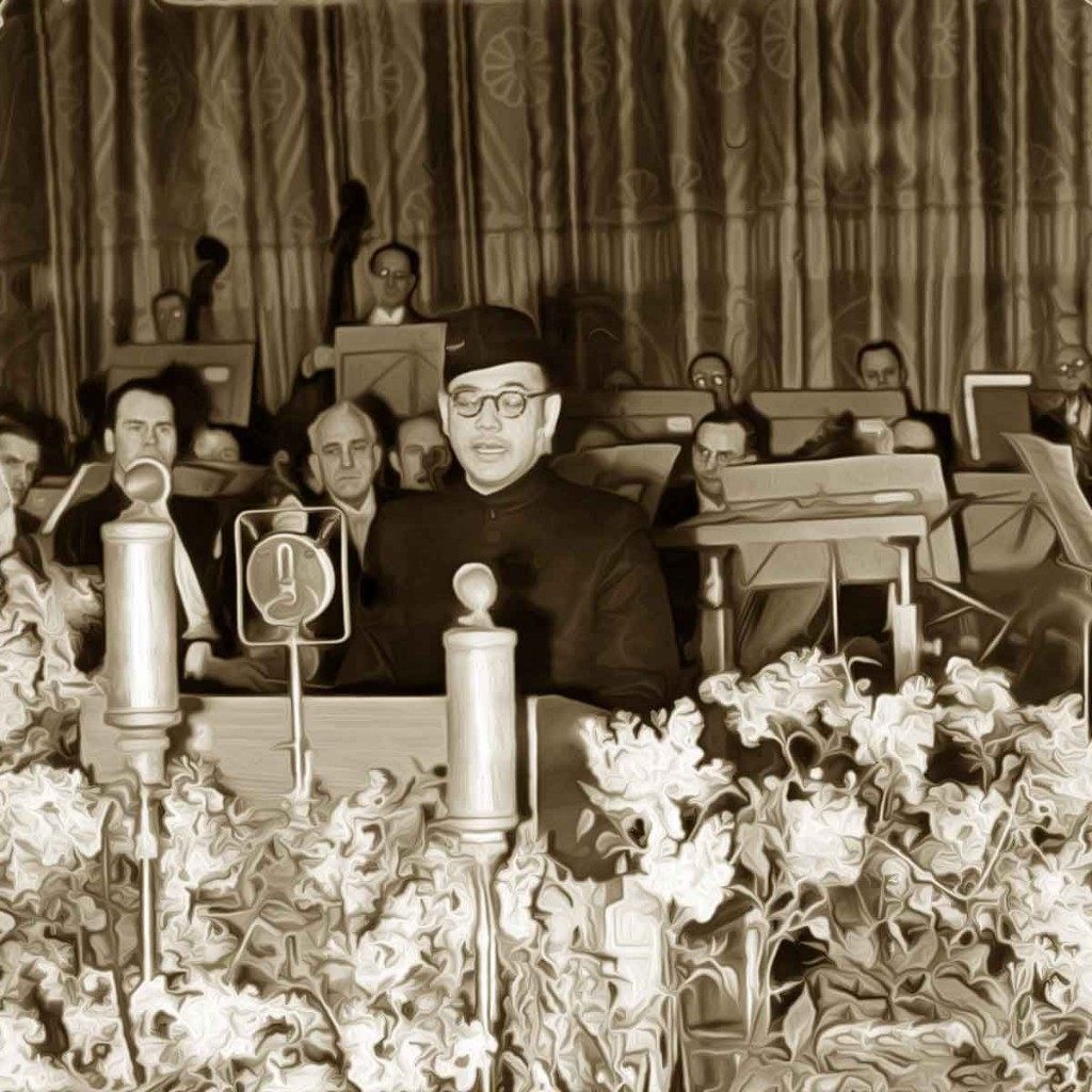 Subhas Chandra Bose speaking at a podium in the Hotel Atlantic, Hamburg, 1942.